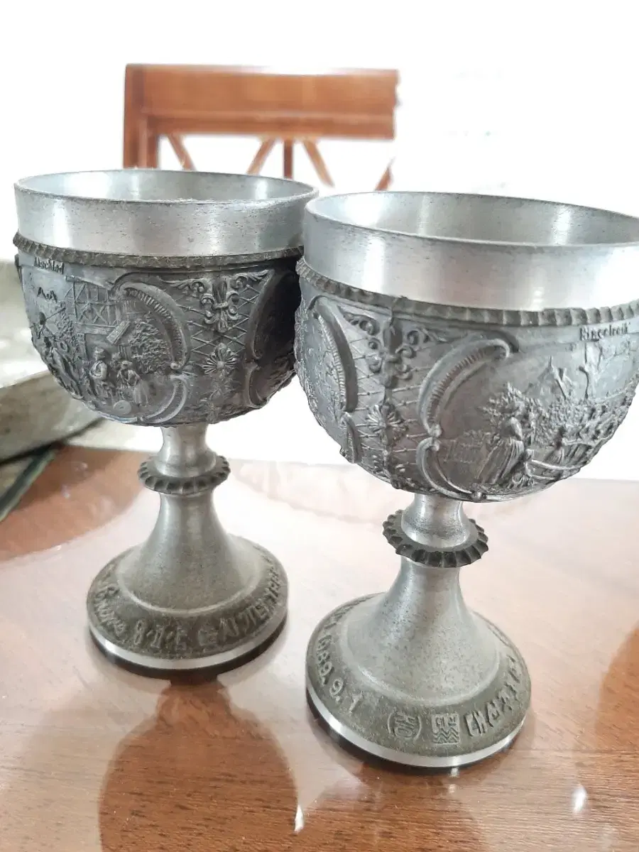 A pair of vintage tin cups made in 1989 