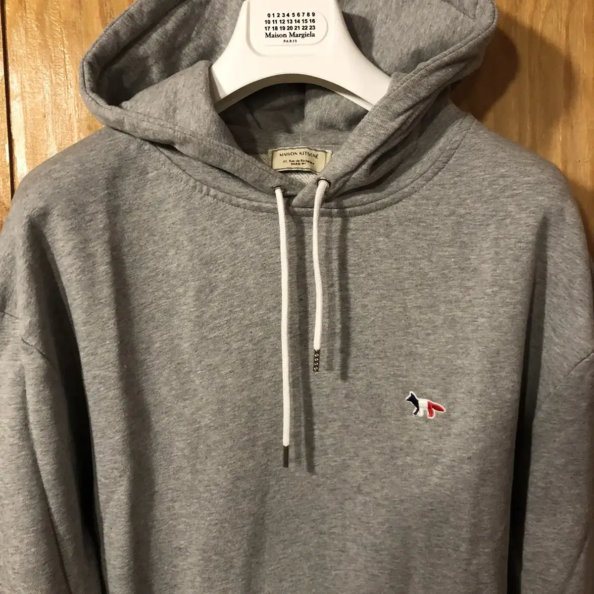 Maison Kitsune tricolor gray hoodie for sale. 