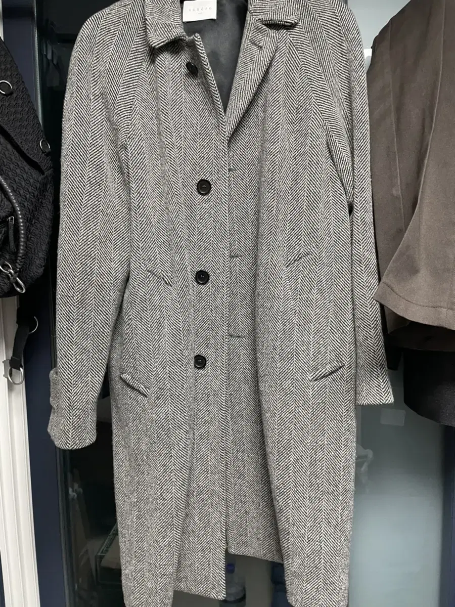 Sandro Homme herringbone wool maccoat for sale.