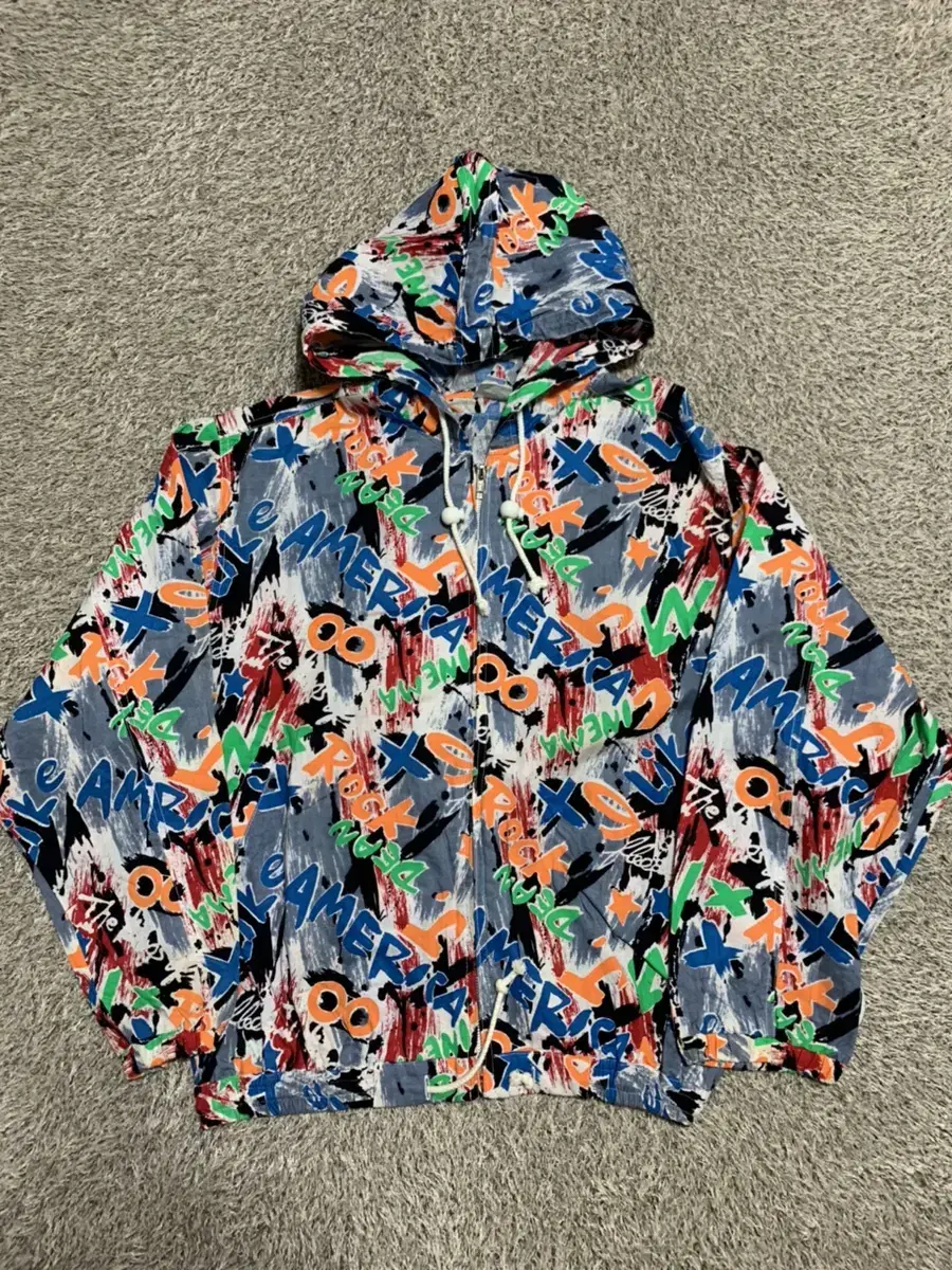 Spellout Pattern Hooded Windbreaker