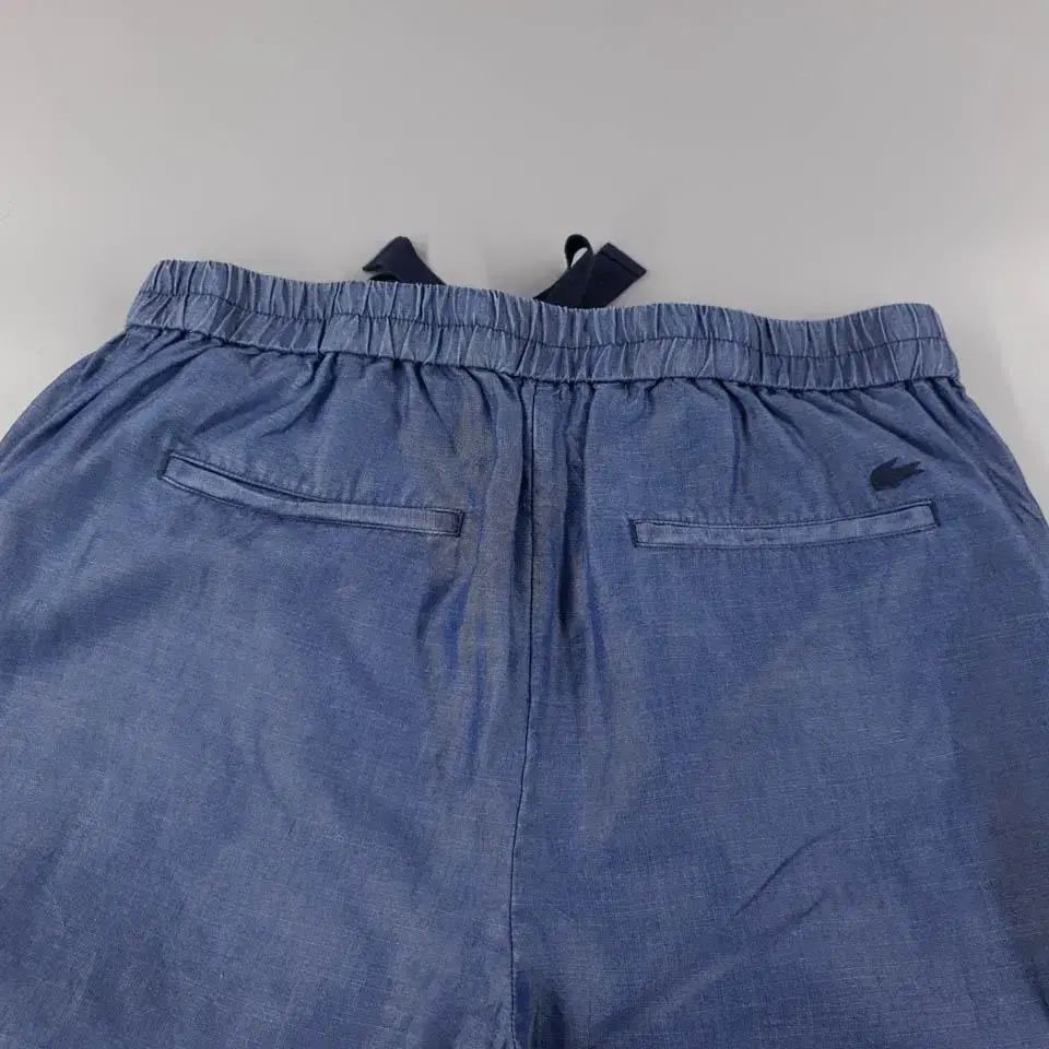 라코스테 딥블루 밴딩 테이퍼드핏 코튼팬츠 면바지  SIZE 32-34