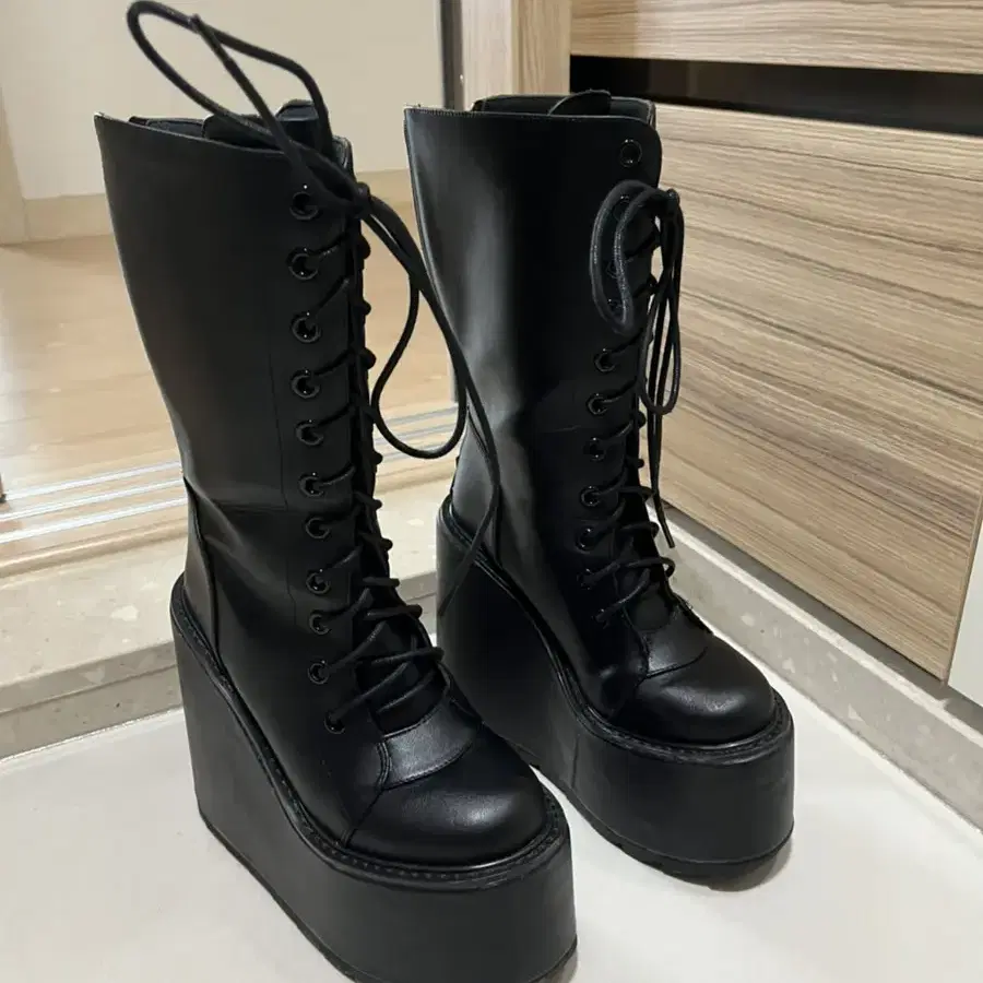 BLACK DUNE LACE-UP PLATFORM BOOTS