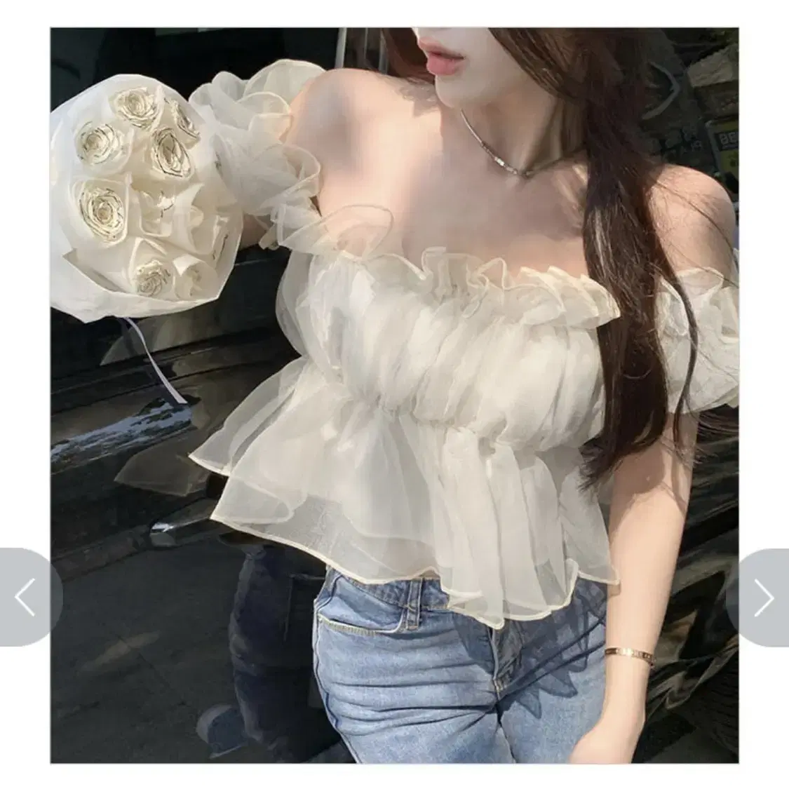 Ruffled off-the-shoulder blouse