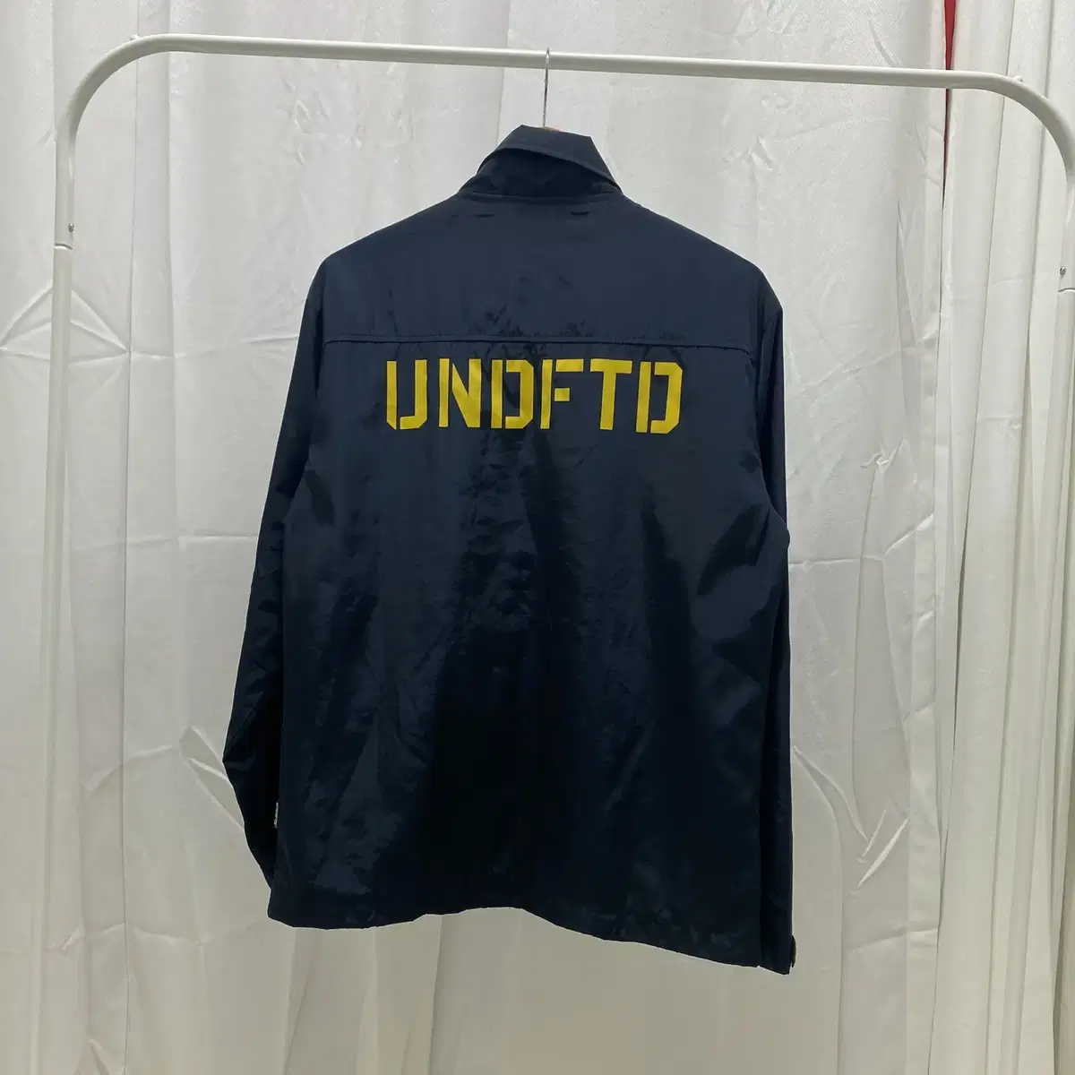 [M] 언더핏 UNDEFEATED 코치자켓 네이비색상