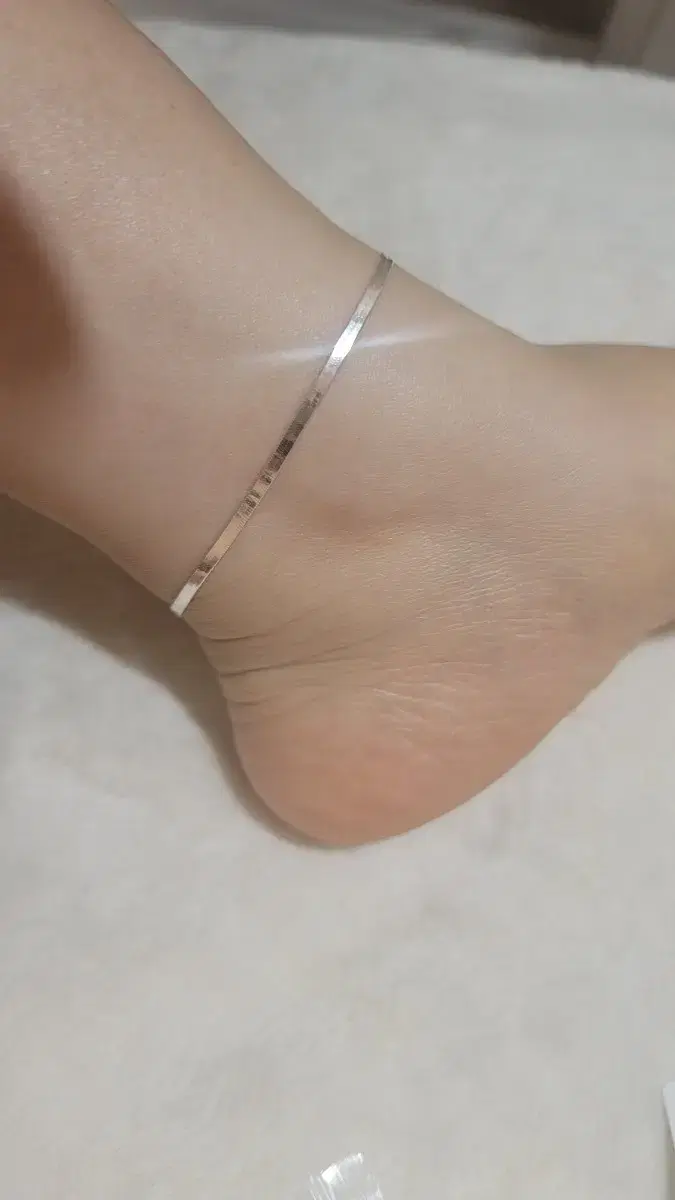 2 silver anklets with snake string