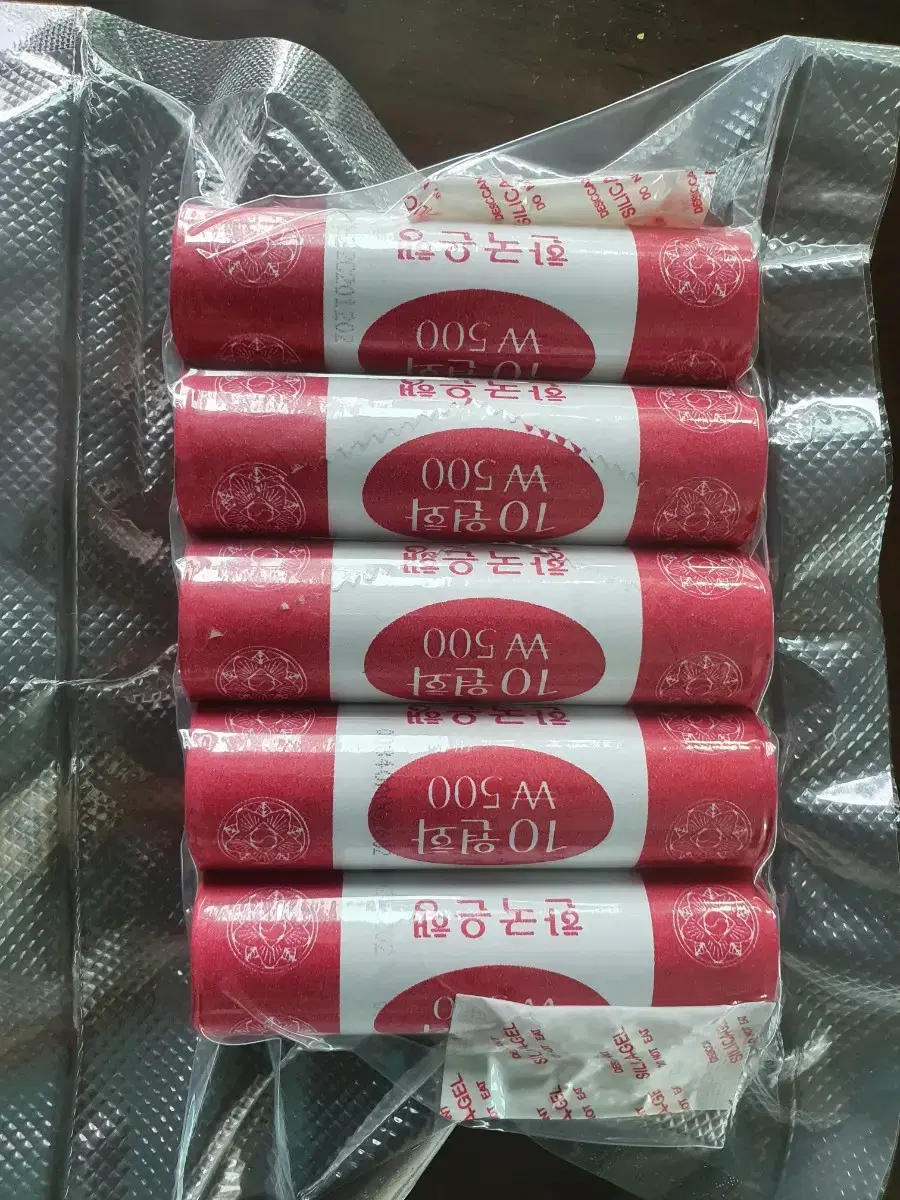 2002 10 zuu 5 rolls of unused currency