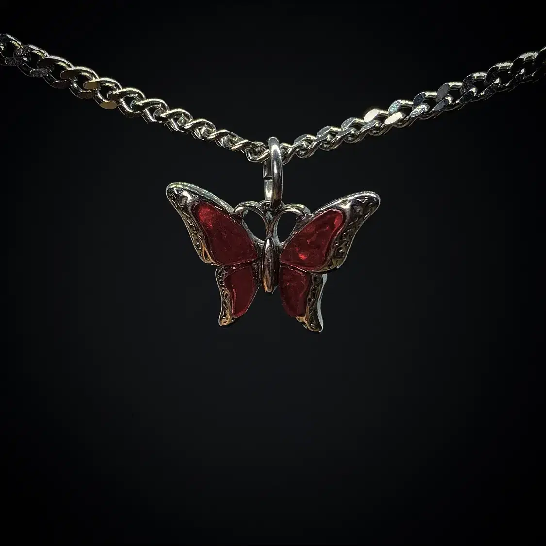 Red butterfly on the chain necklace