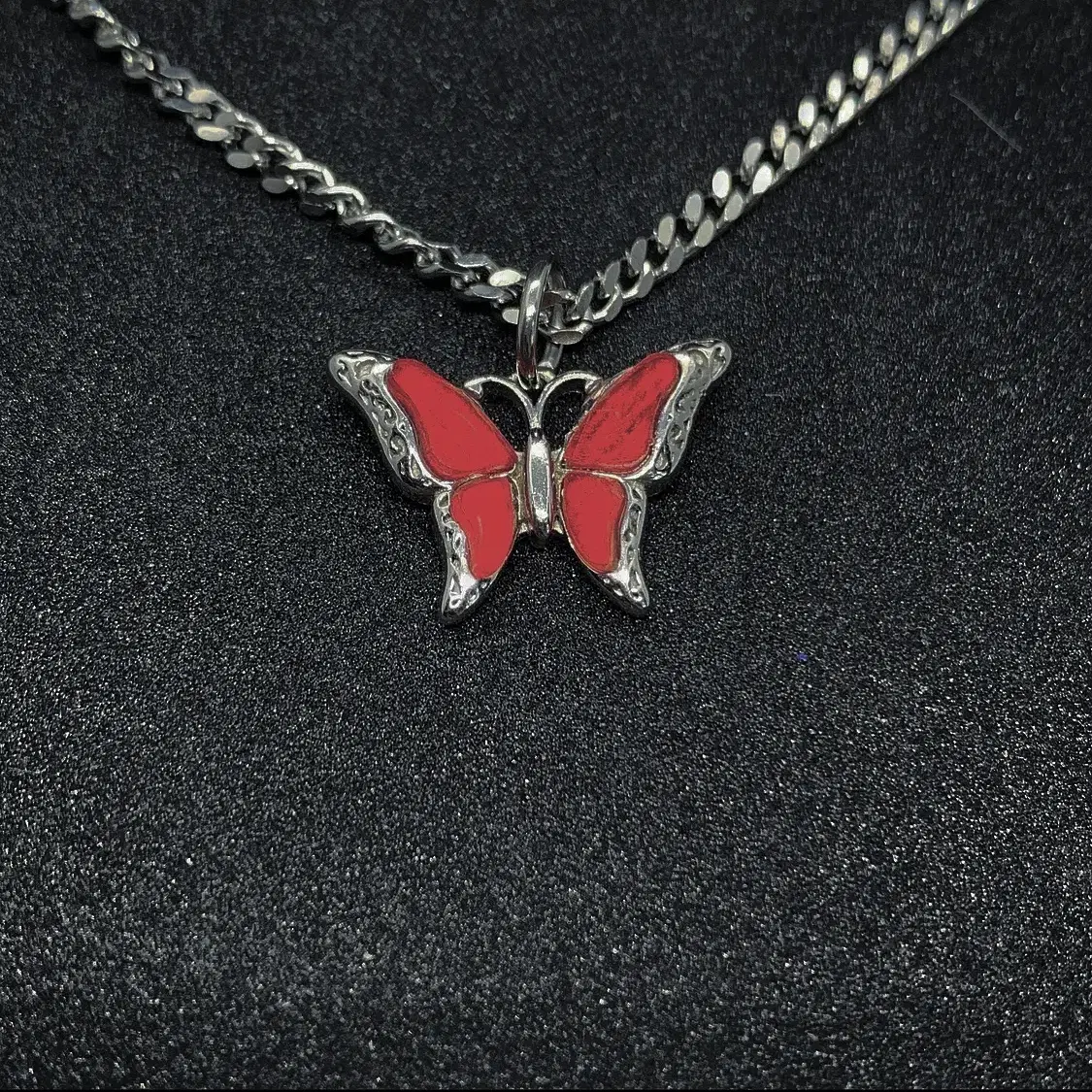 Red butterfly on the chain necklace