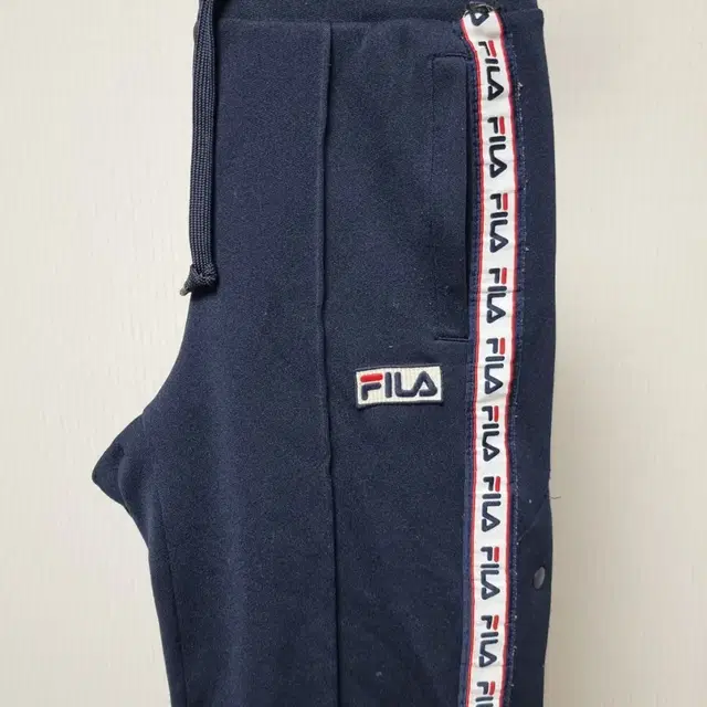 FILA 사이드단추 트레이닝 팬츠 S