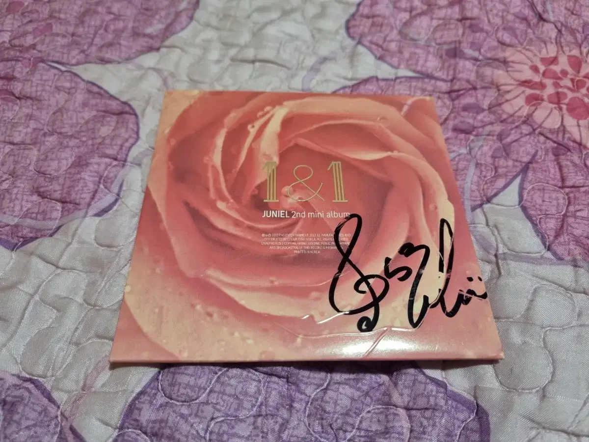 I'm selling a signed album by joonie bimae.