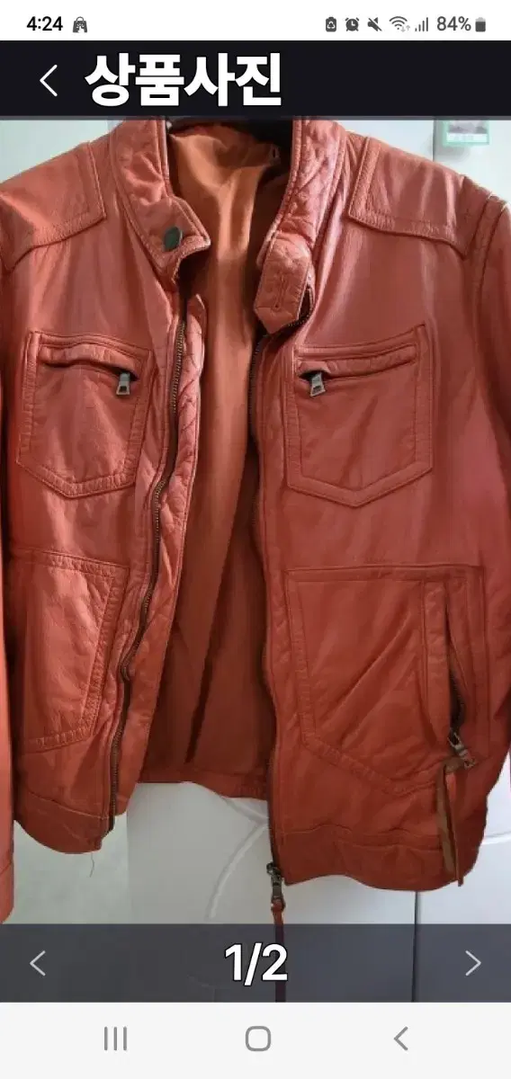 Orange collarLimited edition leather jacket