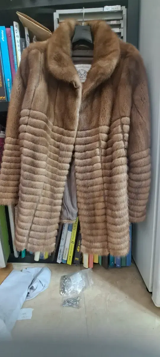 I would like to buy a size 88 natural mink coat in white.