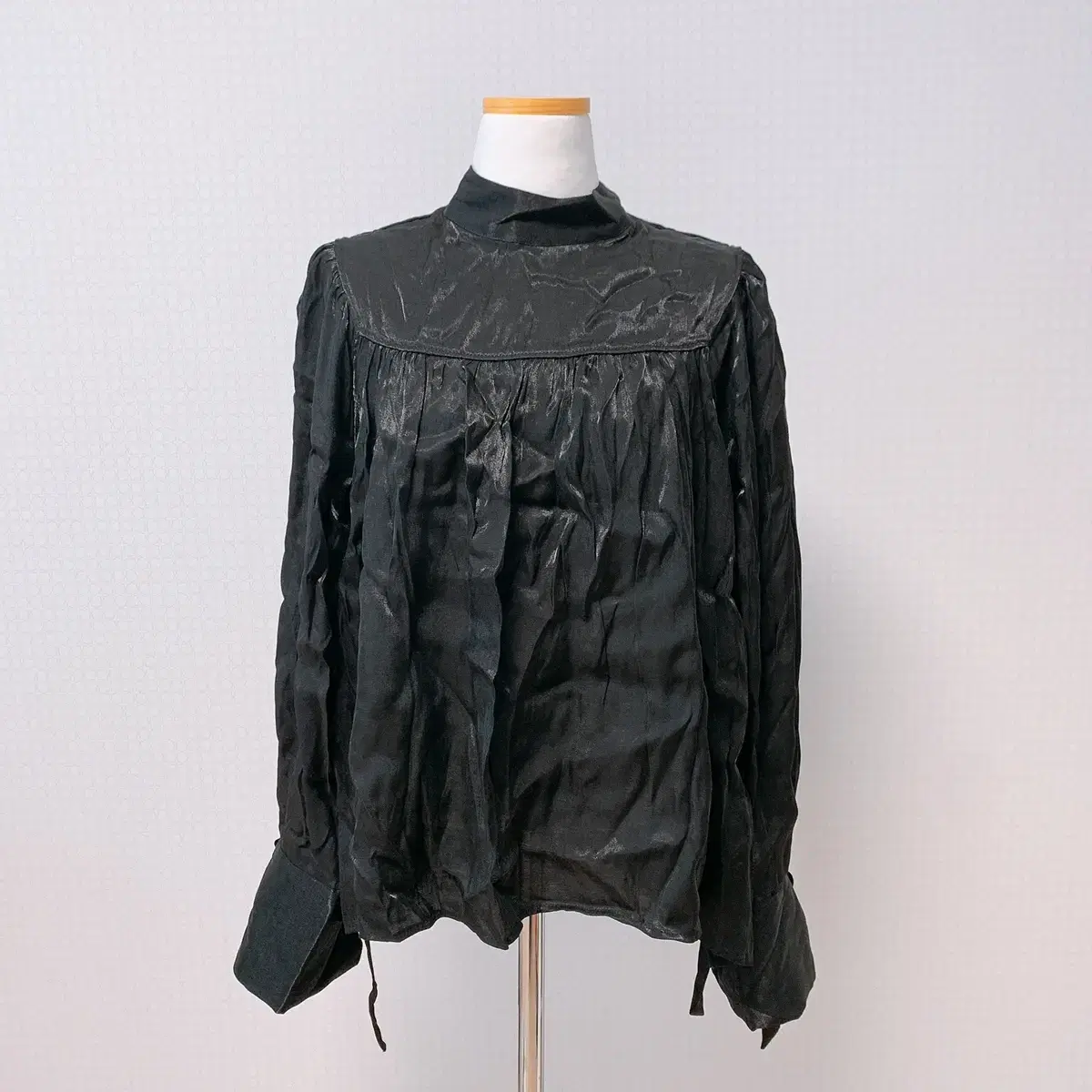 Black satin pleated blouse