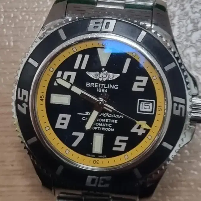 브라이틀링 A17364 슈퍼오션 42mm 메탈팬드 노랭이