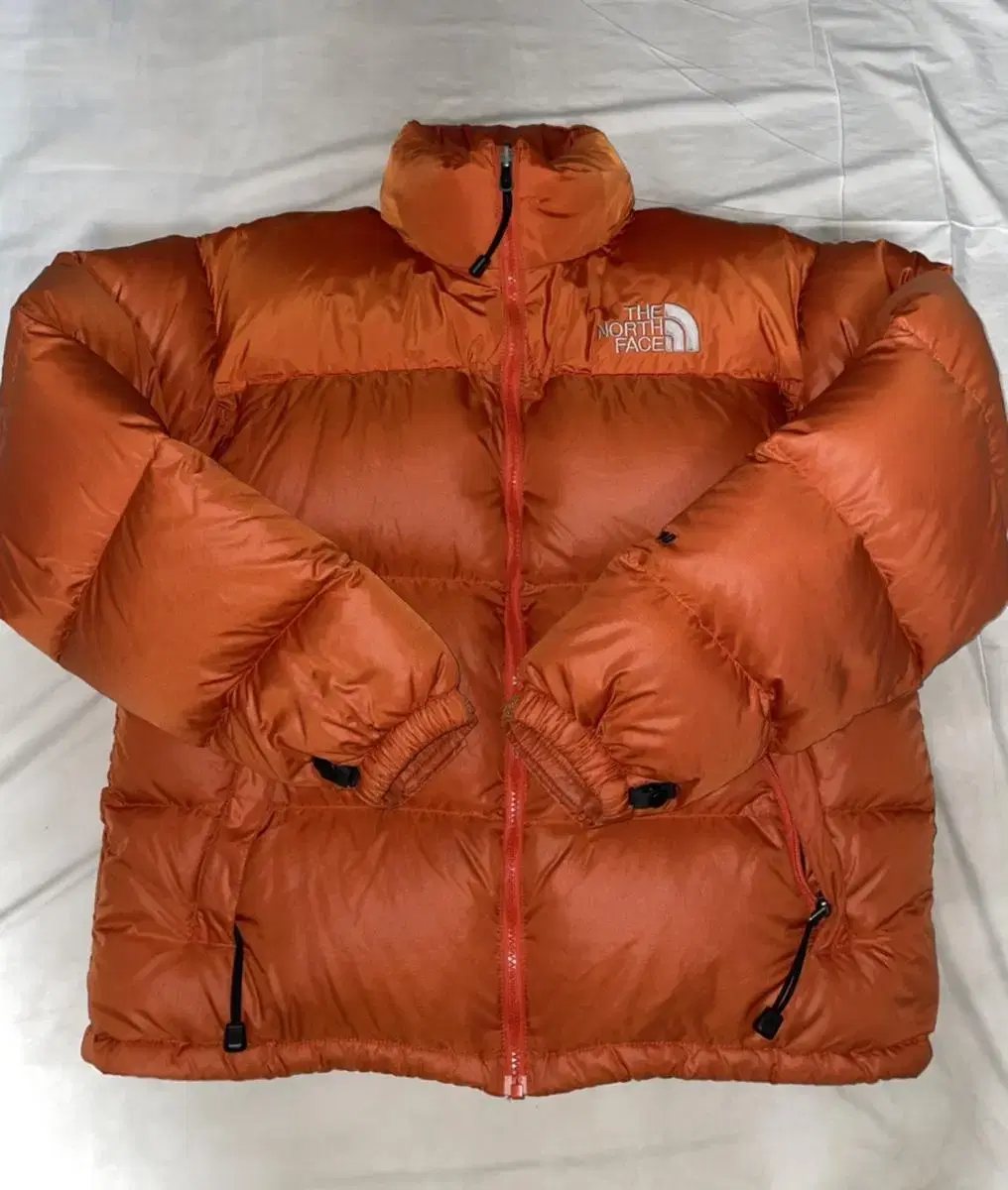 The North Face Nopsy Orange Overseas Back Logo