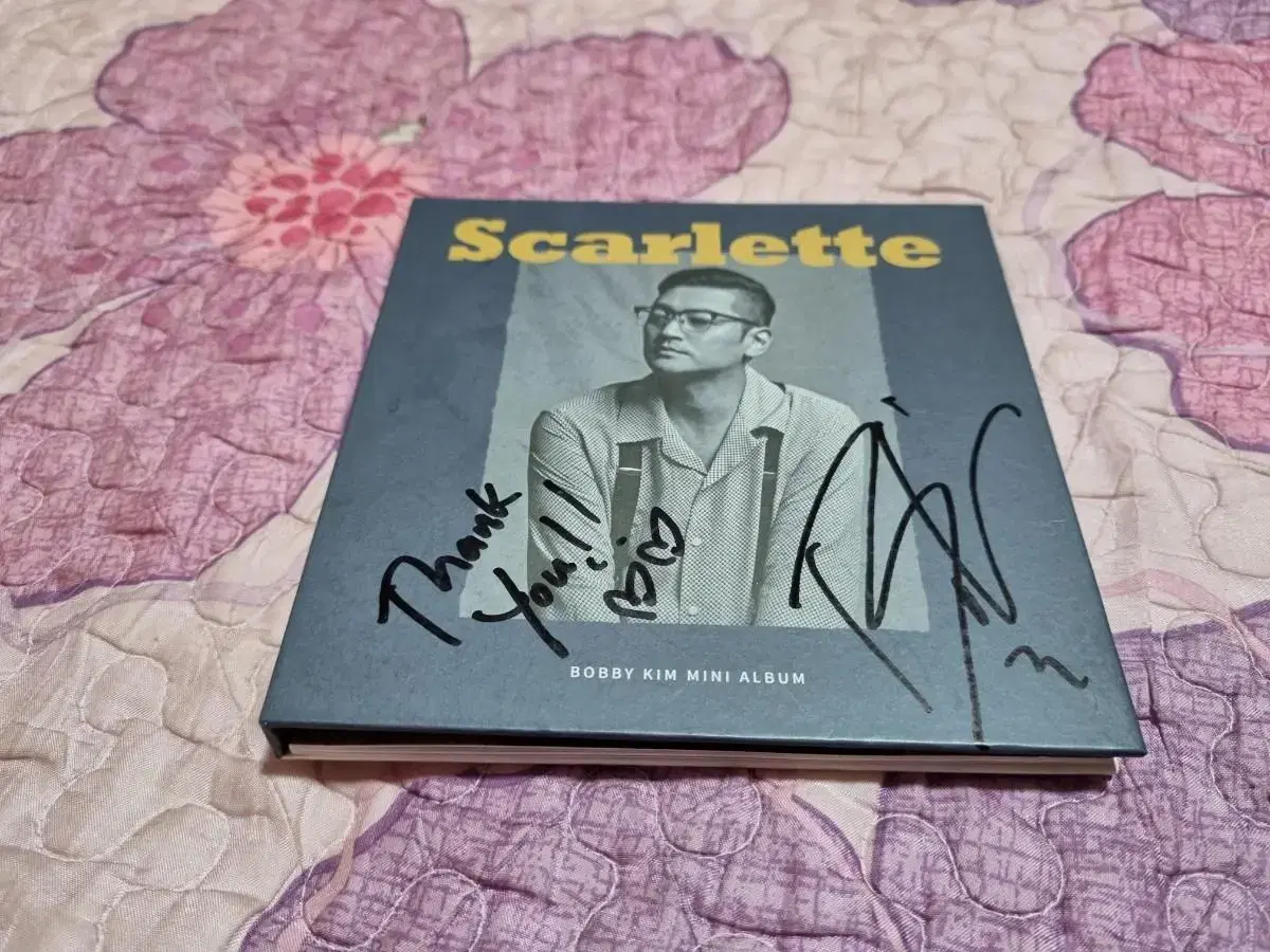 Bobby Kim sells signed album