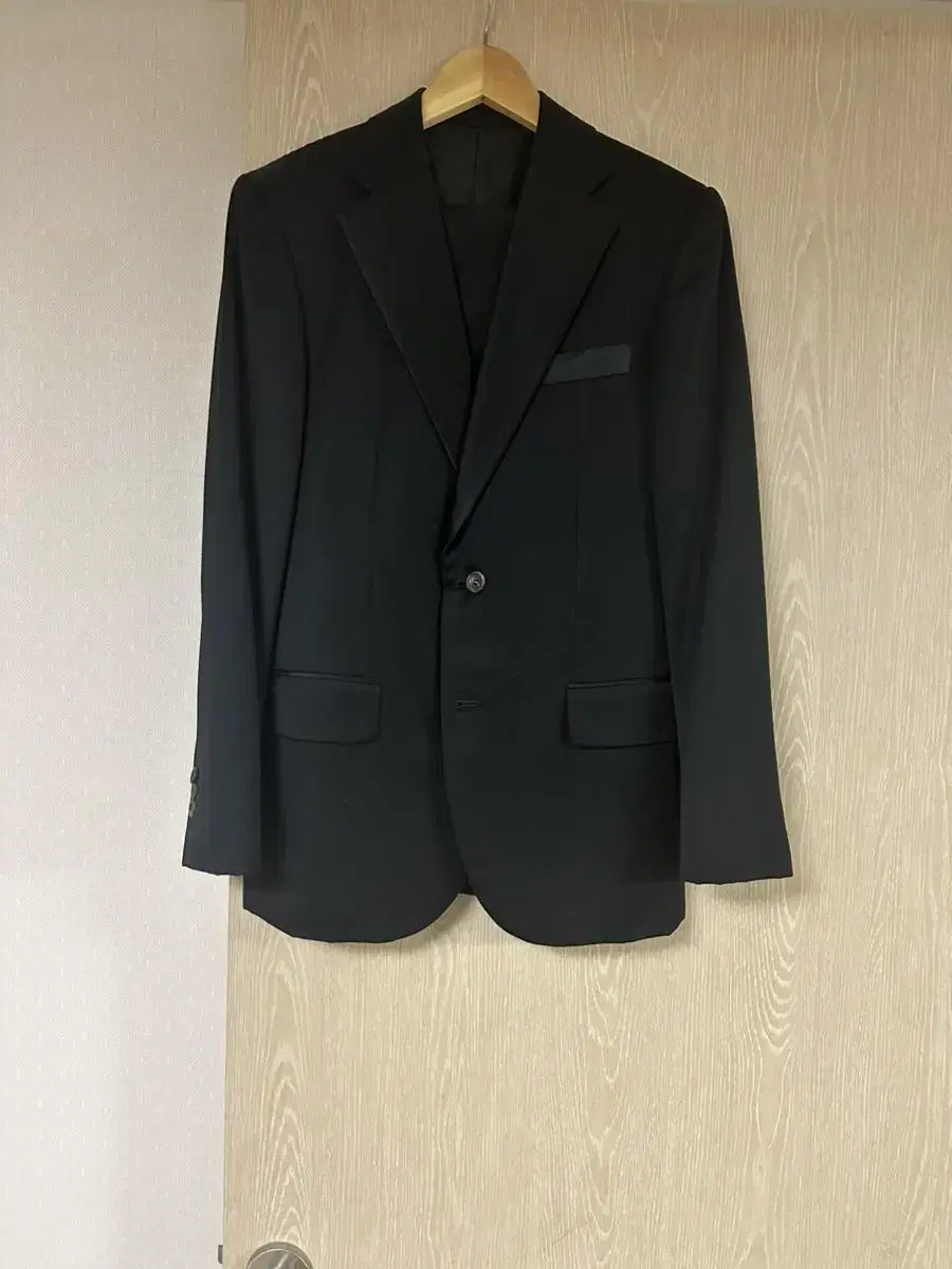 Tailored black suit size 100. about size 30