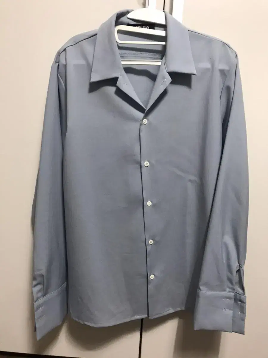 Men's light blue open-collar shirt