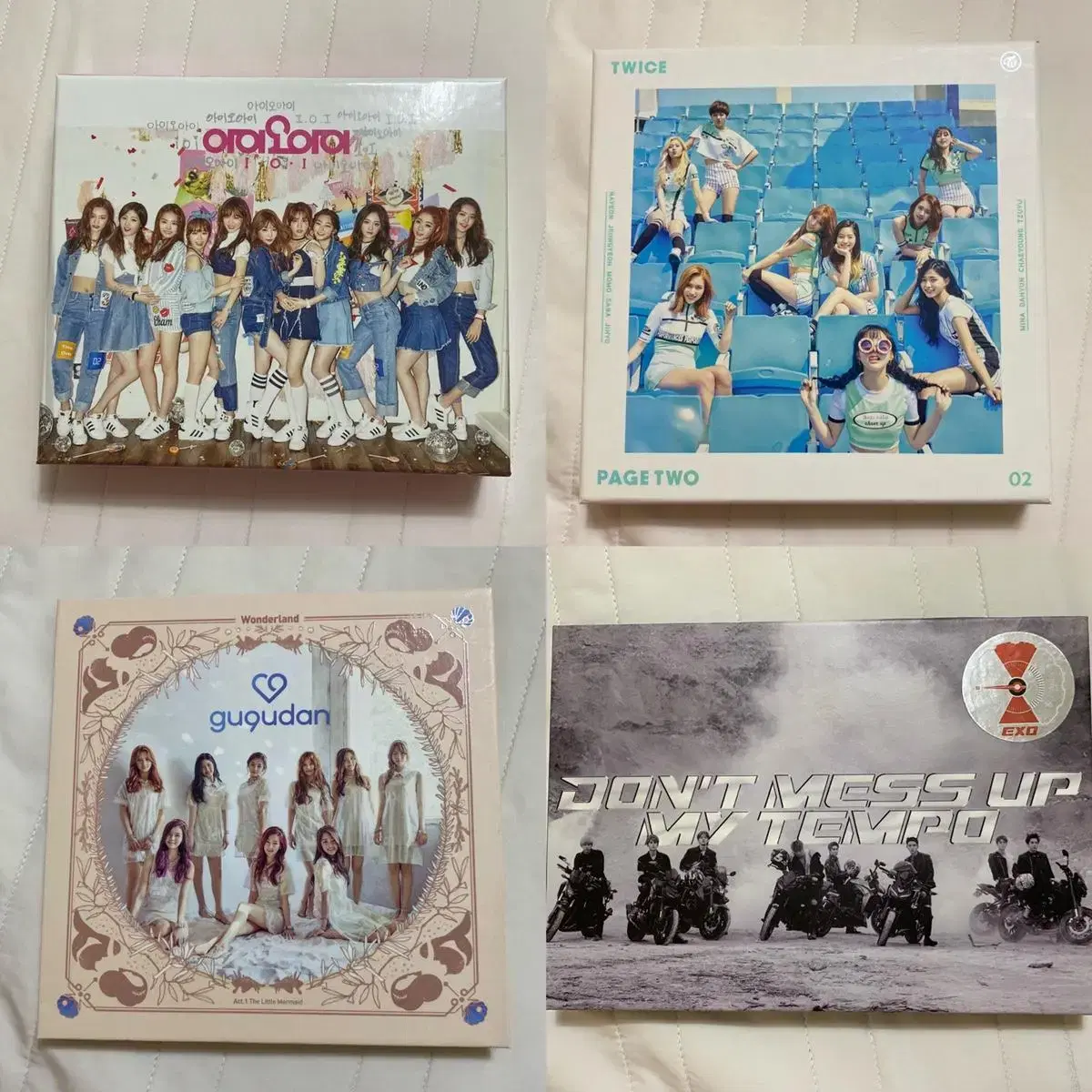 i.o.i twice exo gugudan album unsealed albums