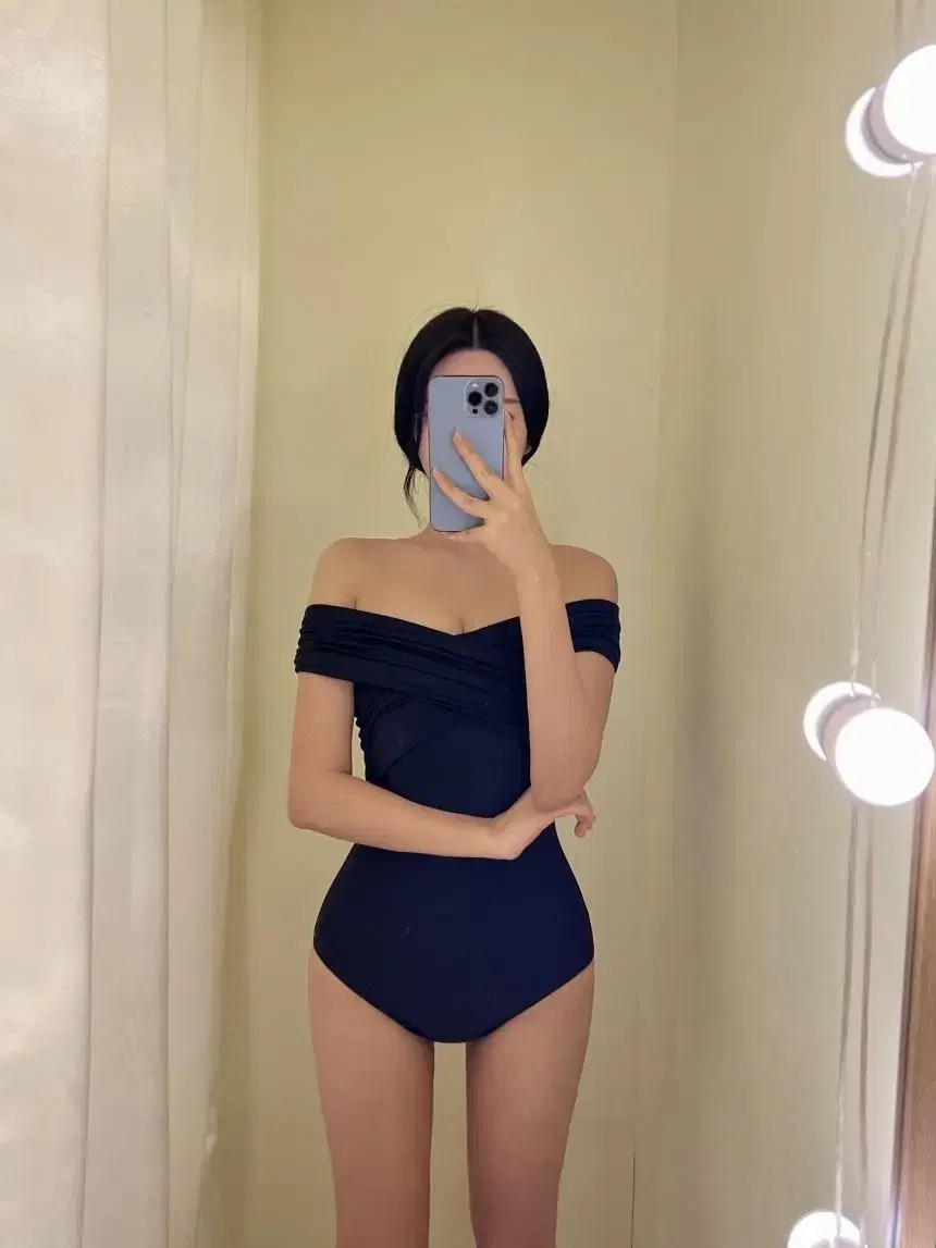 Off-the-shoulder monokini in black for 3.6 million won