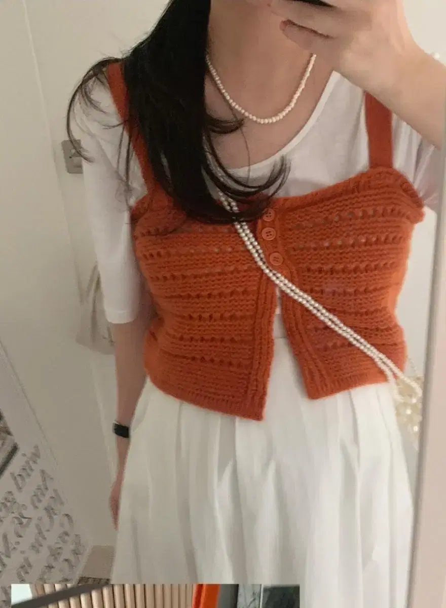 Orange knit button bustier