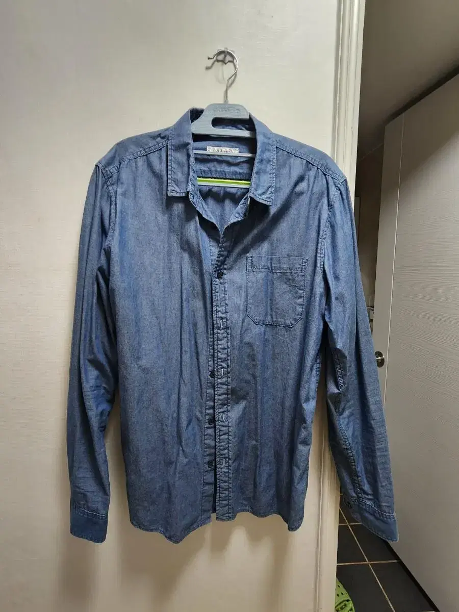 I'm selling my Mindbridge blue shirt, size 105.