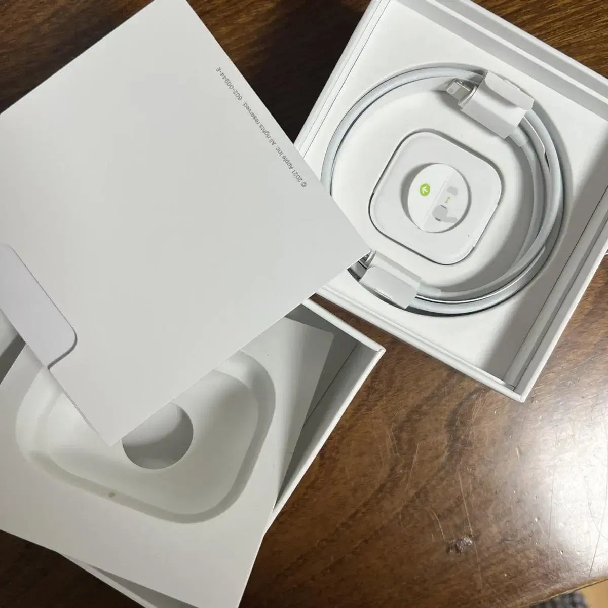 AirPods Pro box and Lightning cable