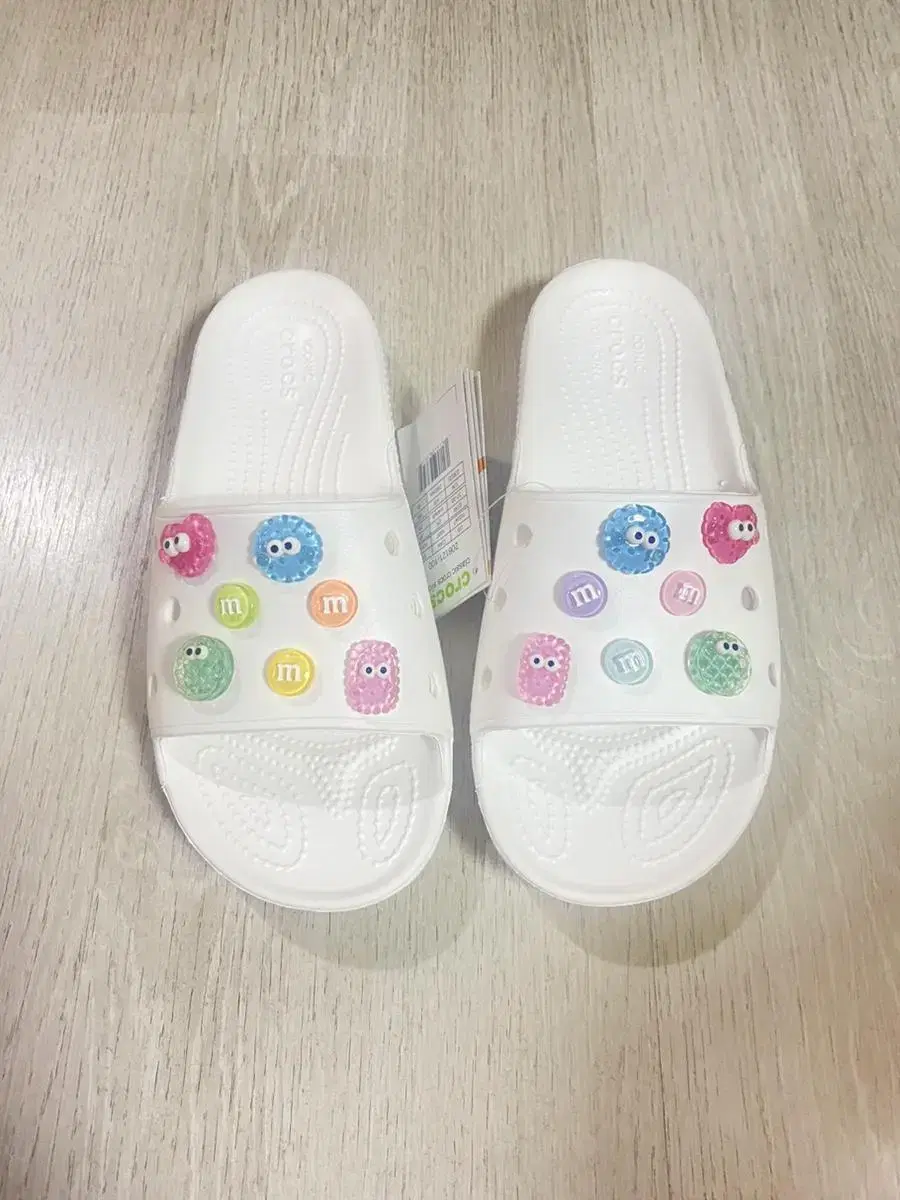 Crocs Slide White 230 with G-Bits for photography