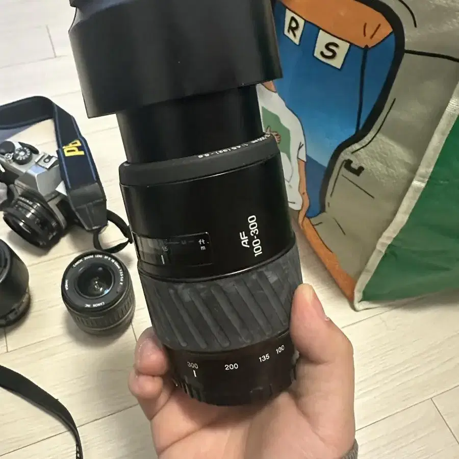 미놀타 af 100-300 4.5 렌즈 팝니다