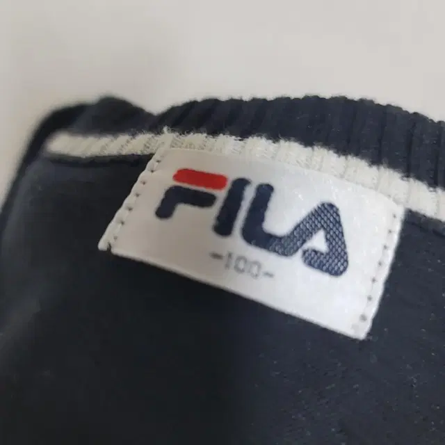 FILA 투톤 칼라니트 100