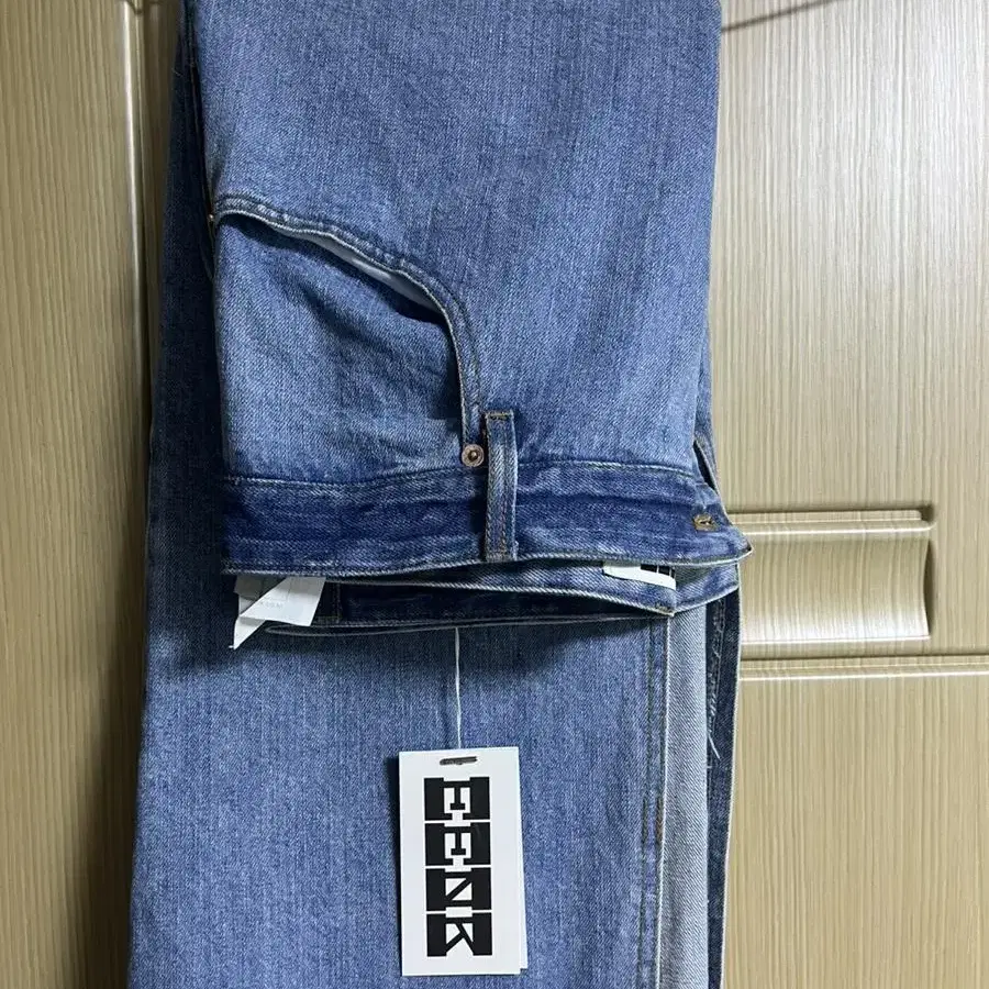 EENK SICOR Asymmetric Front Denim Skirt