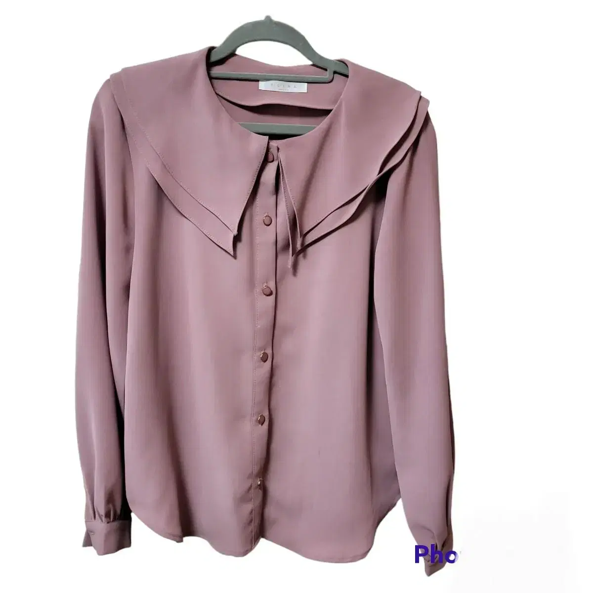 kara, a lavender blouse