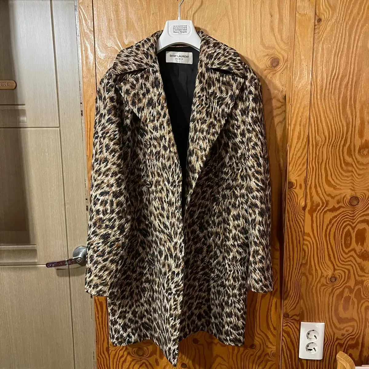 The Saint Laurent leopard coat is sell.