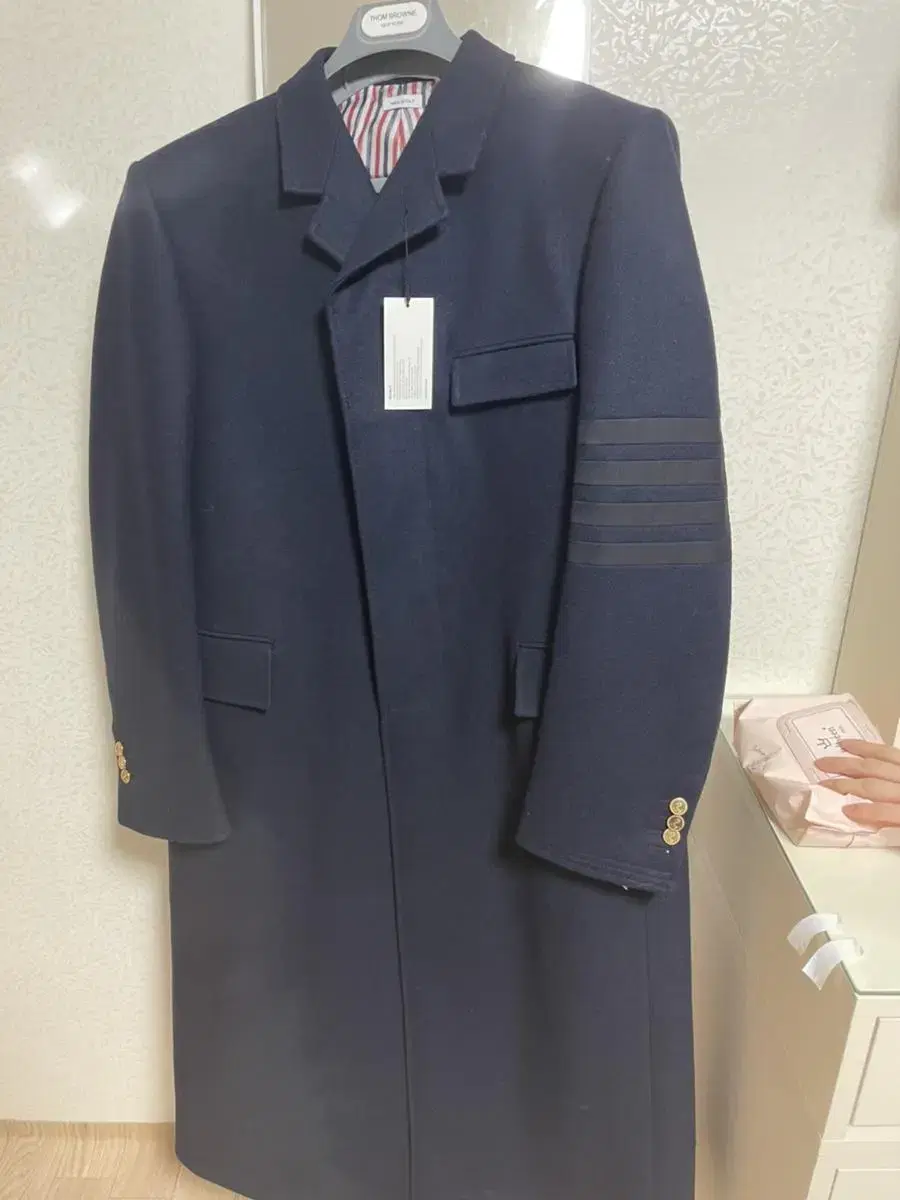 I'm selling my Thom Browne keum long coat.