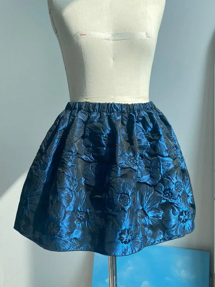 시지엔이 czanne jacquard flower short skirts