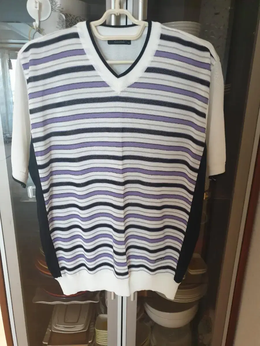 I have a new men's short sleeve knit for sale.