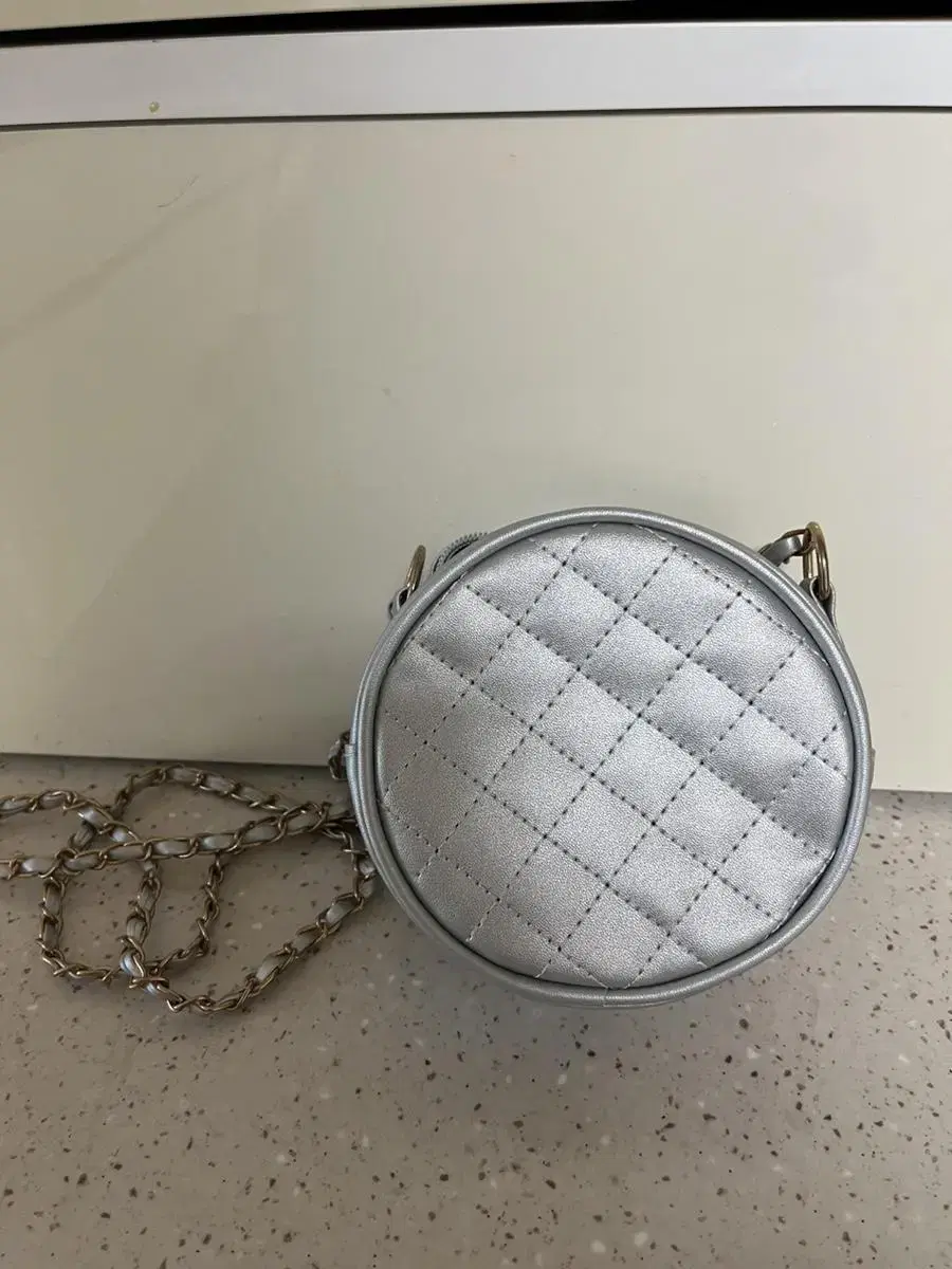 Silver Quilted Tambourine Bag