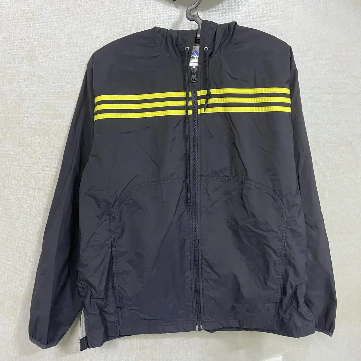 Yellow line detail Adidas windbreaker