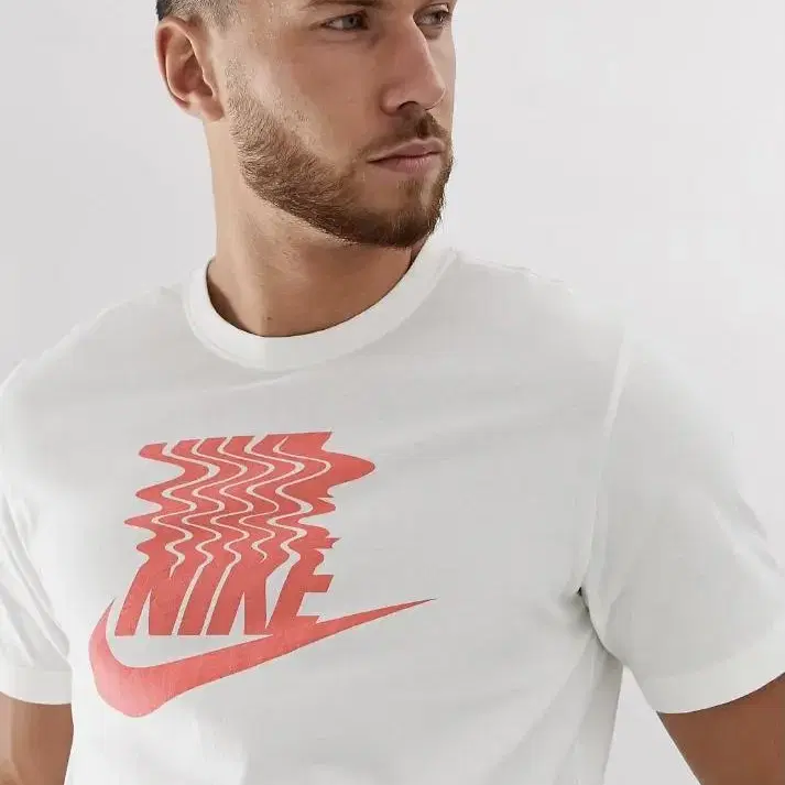 Nike print T-shirts in white