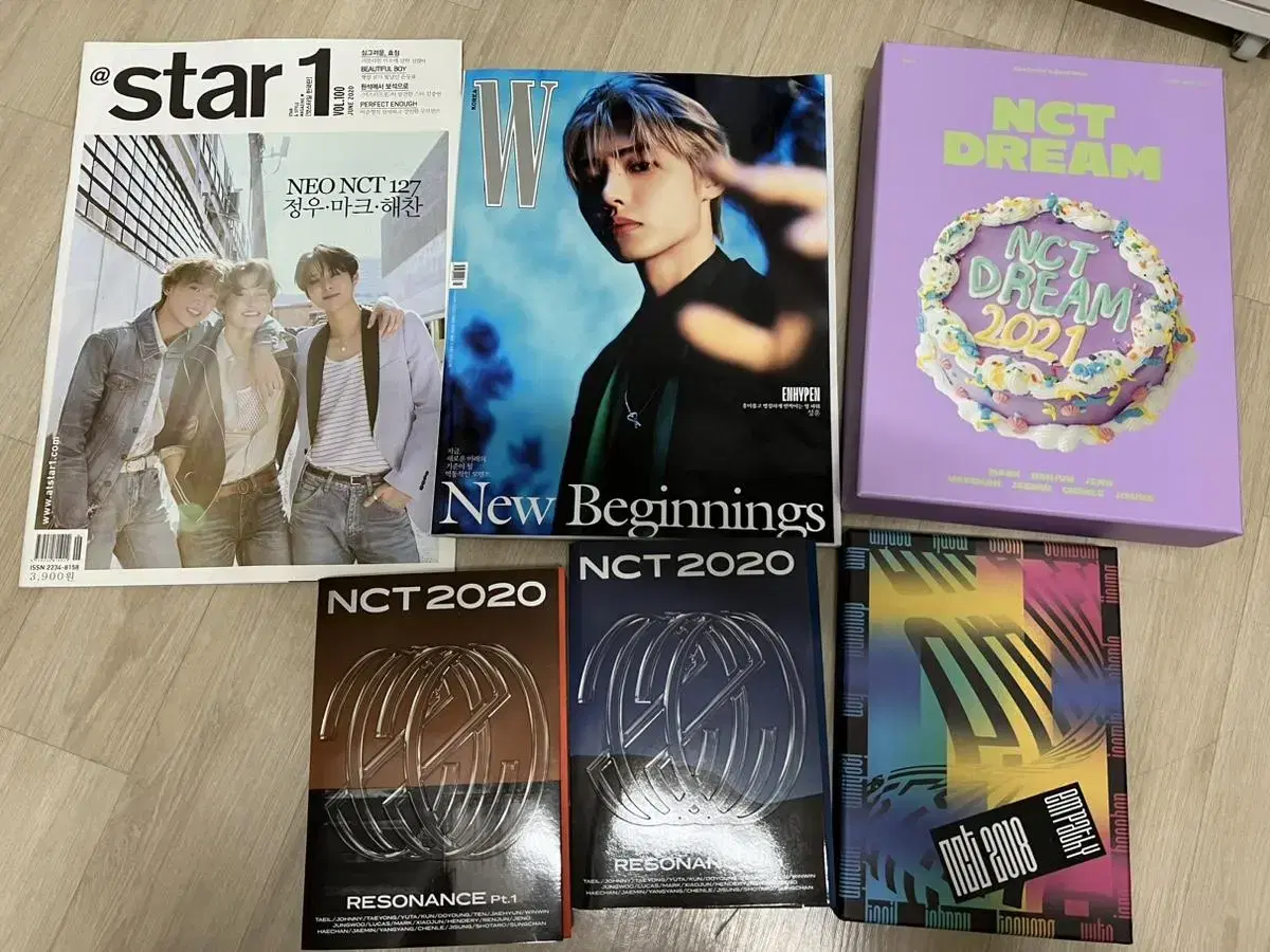 Enhypen & NCT: We're selling magazines, albums, and season's greetings.