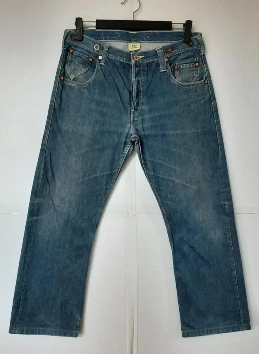 34) Levi's 523 Thousand Patch Denim Raw Edge Wash Straight Leg Jeans