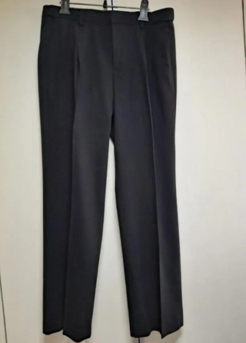 Wide-leg slacks in drawstring moose wool with belt