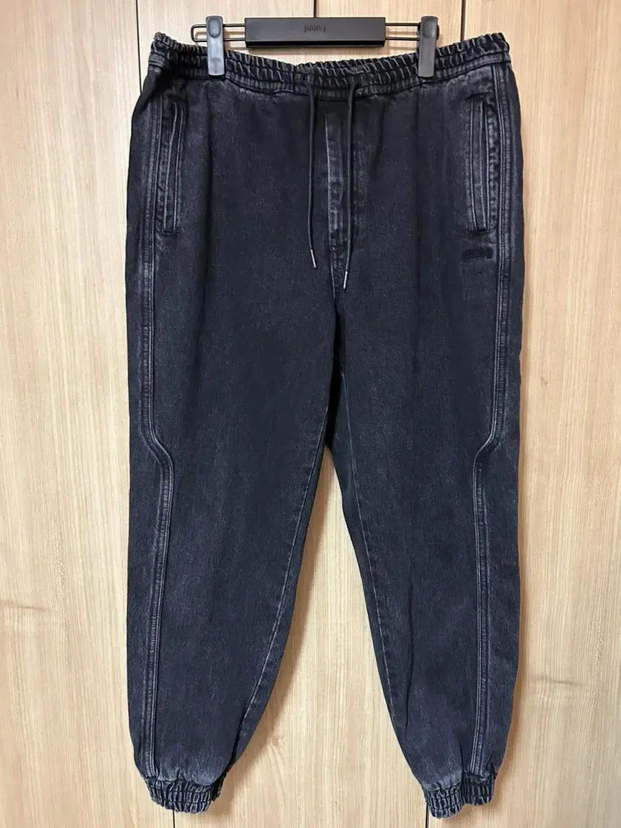 [50] Junji black and blue jogger pants.