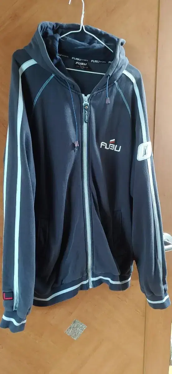 Old-school '90s FUBU posterior hoodie pickup