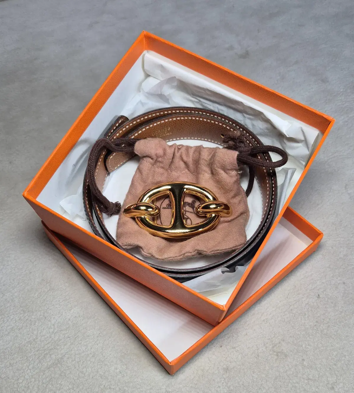 Hermès Shane Gold Belt, including a luxury appraisal