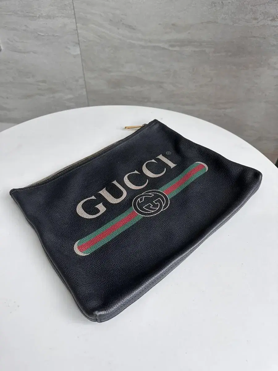 Gucci crossbody bag. I'm selling a clutch.