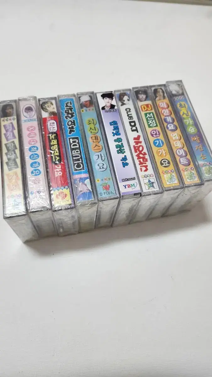 10 unsealed cassette tapes of current hits.