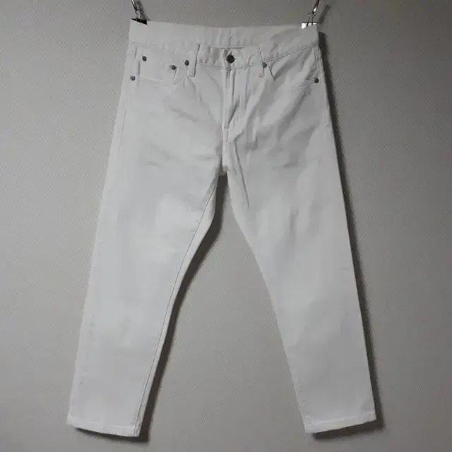 31/Uniqlo White Slim Jeans/31-338