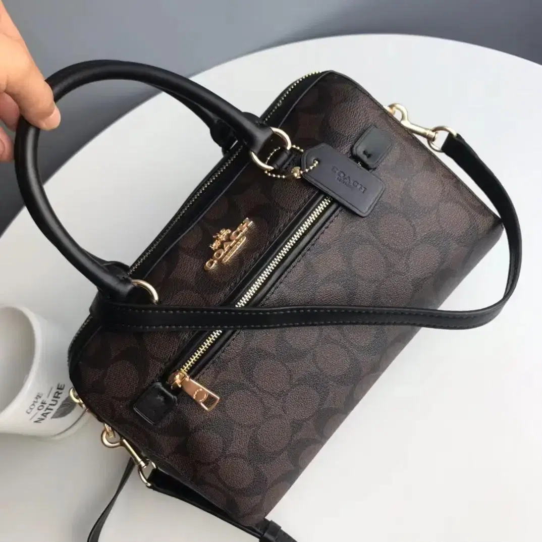 coach로완 사철백 83607