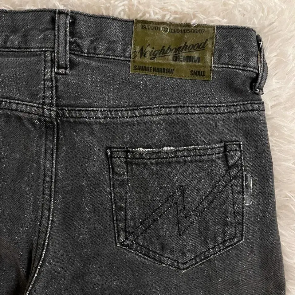 neighborhood graphic denim pants